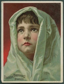 An image of a young girl with a scarf around her head