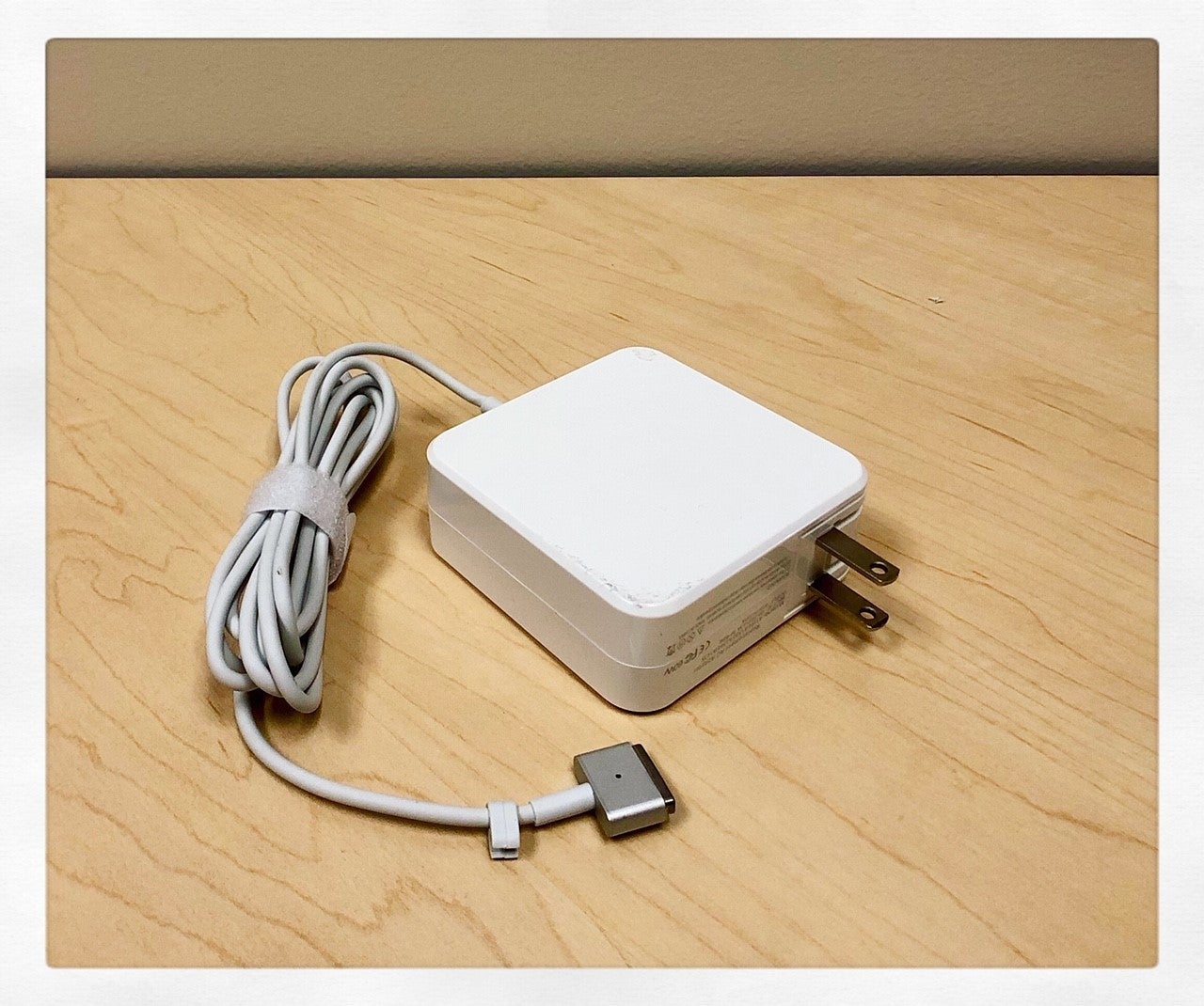 An apple laptop charger 