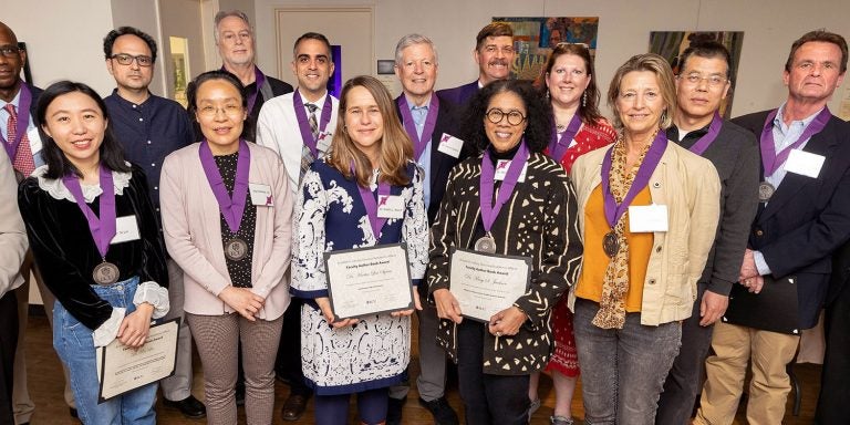 Faculty authors gather after the ECU Main Campus Faculty Author Book and Affordable Textbooks Awards at the Janice Hardison Faulkner Gallery. (Photos by Rhett Butler.)