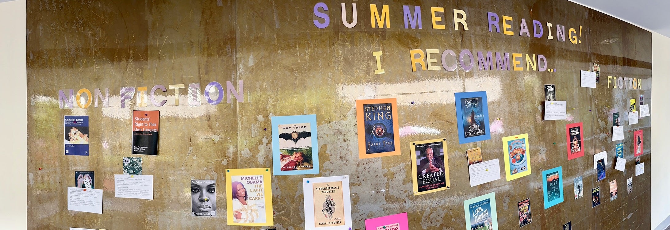 Summer Reading Recommendations magnet wall on the first floor of the library. (Photos by Ronnie Woodward) 