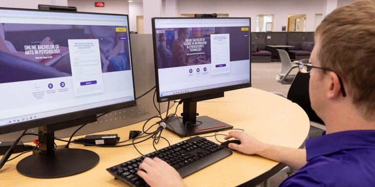 The research and instructional services area on the first floor of the library features an abundance of computers. (ECU News photo by Rhett Butler)